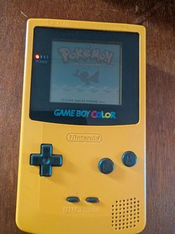 Yellow Gameboy Color with Pokemon Gold