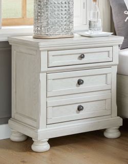 Nightstand with hidden drawer. Antique white wood.