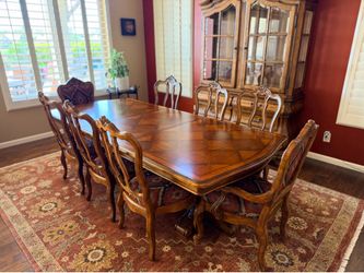 Ethan Allen 8 chair dining table and hutch