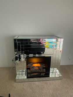 Mirrored Fire place with electric plug in log