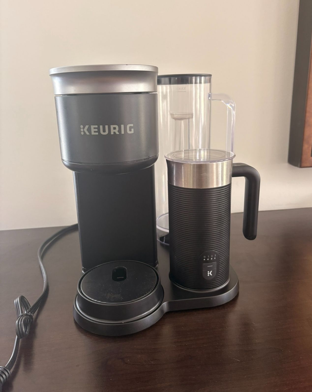 Keurig K-Cafe Coffee Maker with Milk Frother, it includes filters and 40+ K-Cups