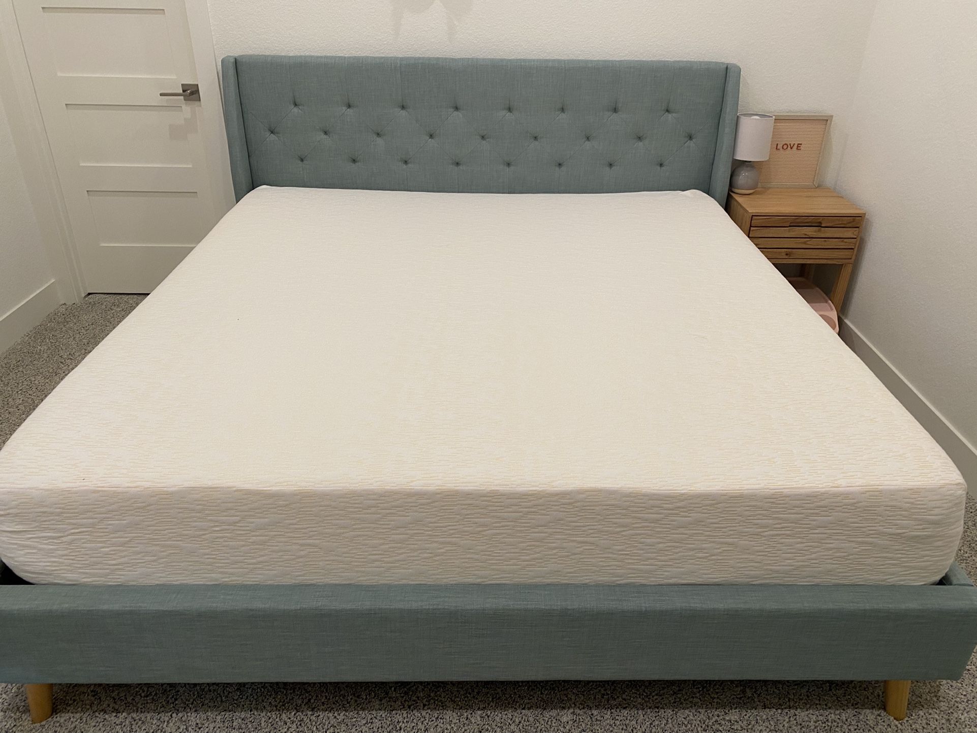 Standard king size bed Frame And Matress. Cool gel memory foam mattress. Practically new. Barely used.