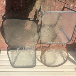 4 small glass outside tables