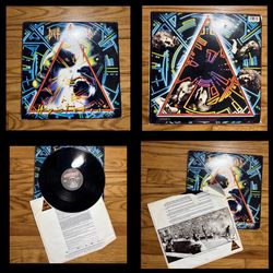 1987 Def Leppard ‎Hysteria LP Vinyl Album record is in fair Condition!
