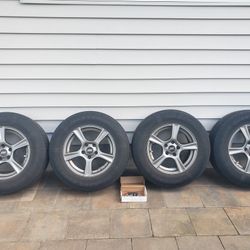 4 tires/wheels 215/70R16