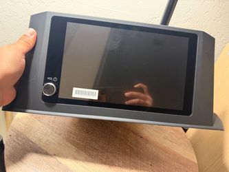 Car Touchscreen Head Unit with Dash Trim for 4th gen Toyota Tacoma.