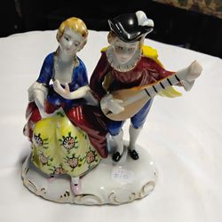  Ceramic. Man playing a beautiful song to his wife.#11 