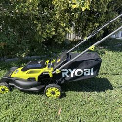 NEW OPEN BOX RYOBI 16 INCHES 18 V BRUSHLESS PUSH LAWNMOWER IS AN ORIGINALBOX INCLUDES TWO 2Am LITHIUM BATTERIES WITH FAST  CHARGER GRASS CATCHER. IT'S