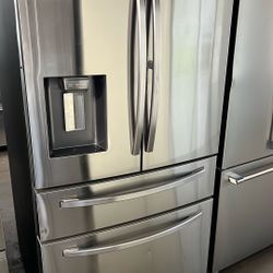 SAMSUNG FOUR DOOR REFRIGERATOR WITH DOOR IN DOOR 
