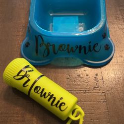 Dog bowl and trash bag/flashlight 