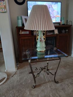 vintage lamp with shade $40.00. If it's up it's available