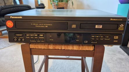 Panasonic VHS and DVD player with 36 VHS tapes