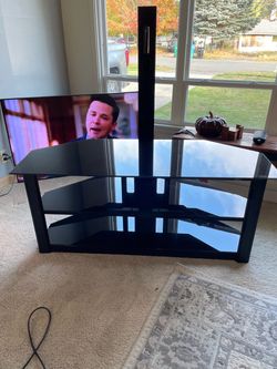 Tv stand w/3black shelves