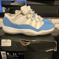 Air Jordan 11 Retro Low ‘UNC’  Sneaker in White and University Blue