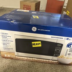 Brand New GE microwave. Still In Box. 120