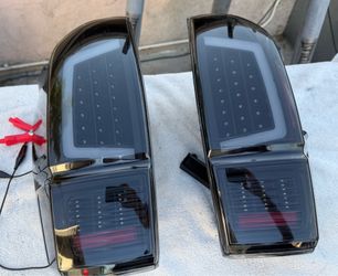 16-22 Toyota Tacoma Black Smoke Full LED Tail Lights