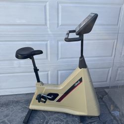 Professional grade Life Fitness Lifecycle 5500 upright stationary exercise bike.
