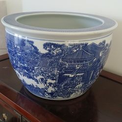 Chinese blue and white porcelain planter or fish bowl with a landscape design. 