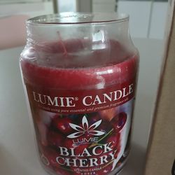 Jumbo black cherry candle in glass jar 21 oz, new in box
