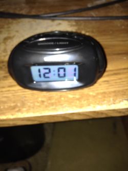 'Sharp' battery powered travel alarm clock