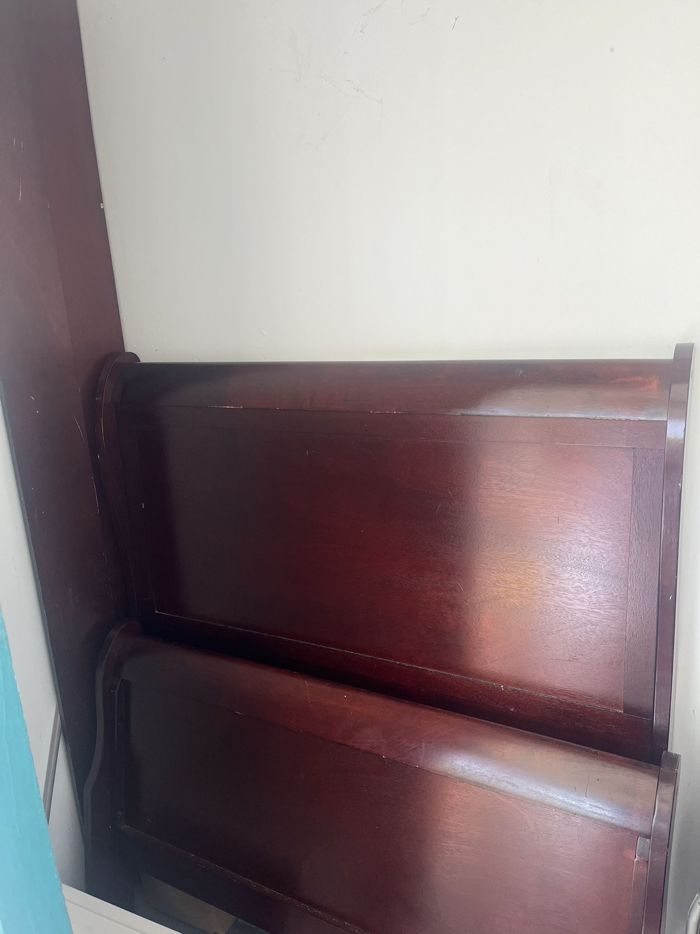 wood Twin bed almost new has been in storage