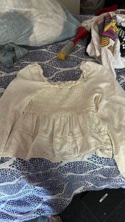 white ruffle shirt