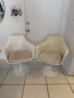 Pair of White Tulip Swivel Armchairs with Cushions