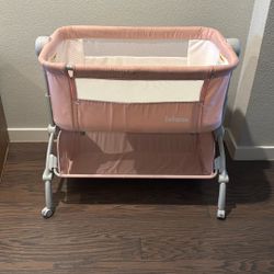 Lightly Used Infans Bedside Bassinet – Adjustable Height, Pink – Excellent Condition 