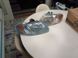 2001 through 2007 Town and country headlights 2001 through 2007 Dodge caravan headlights