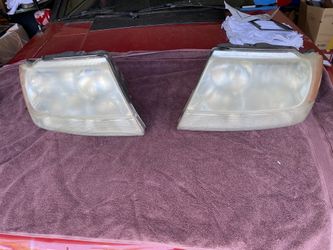 99-04 Jeep Grand Cherokee headlights