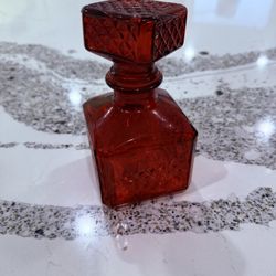 Small red apothecary jar