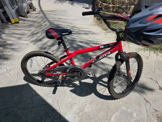 20 inch boys bike with helmet.  $30 cash, you pick up.