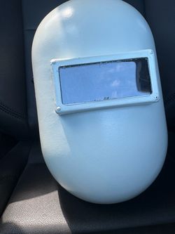 Fiber metal welding hood