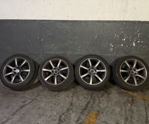G35 Seven Spoke Rims With Continental Tires