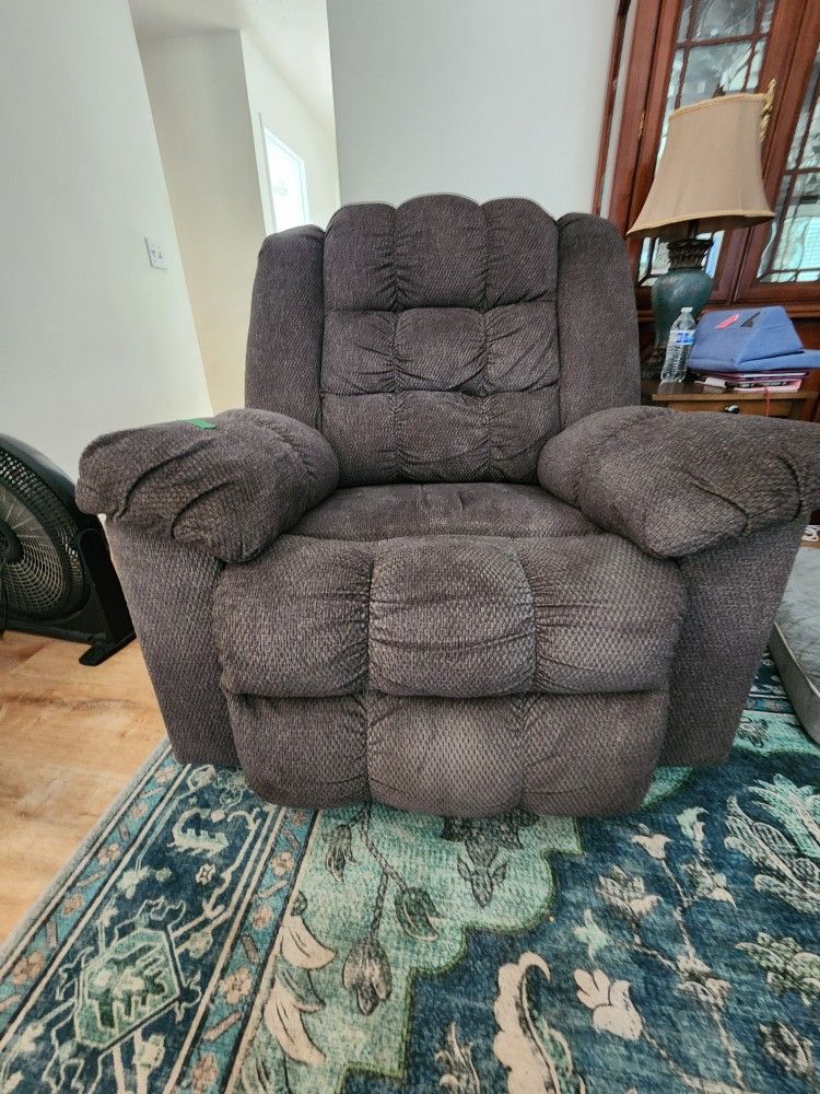 Signature Design by Ashley® Stayfish Gunmetal Manual Rocker Recliner. Extra Wide
