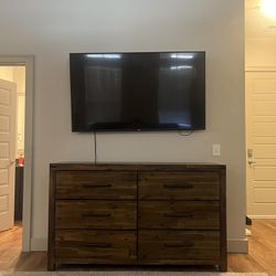 Dresser And 65”Flatscreen Vizio + Plus Wall Mount