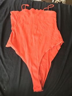 orange bodysuit