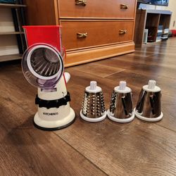 Kitchen HQ Speed Grater and Slicer with Suction Base Refurbished, 3 interchangeable stainless steel rotary grater/slicer drums, works great
