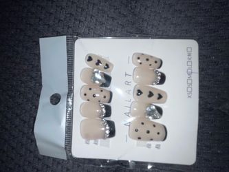 Nails with designs and gems