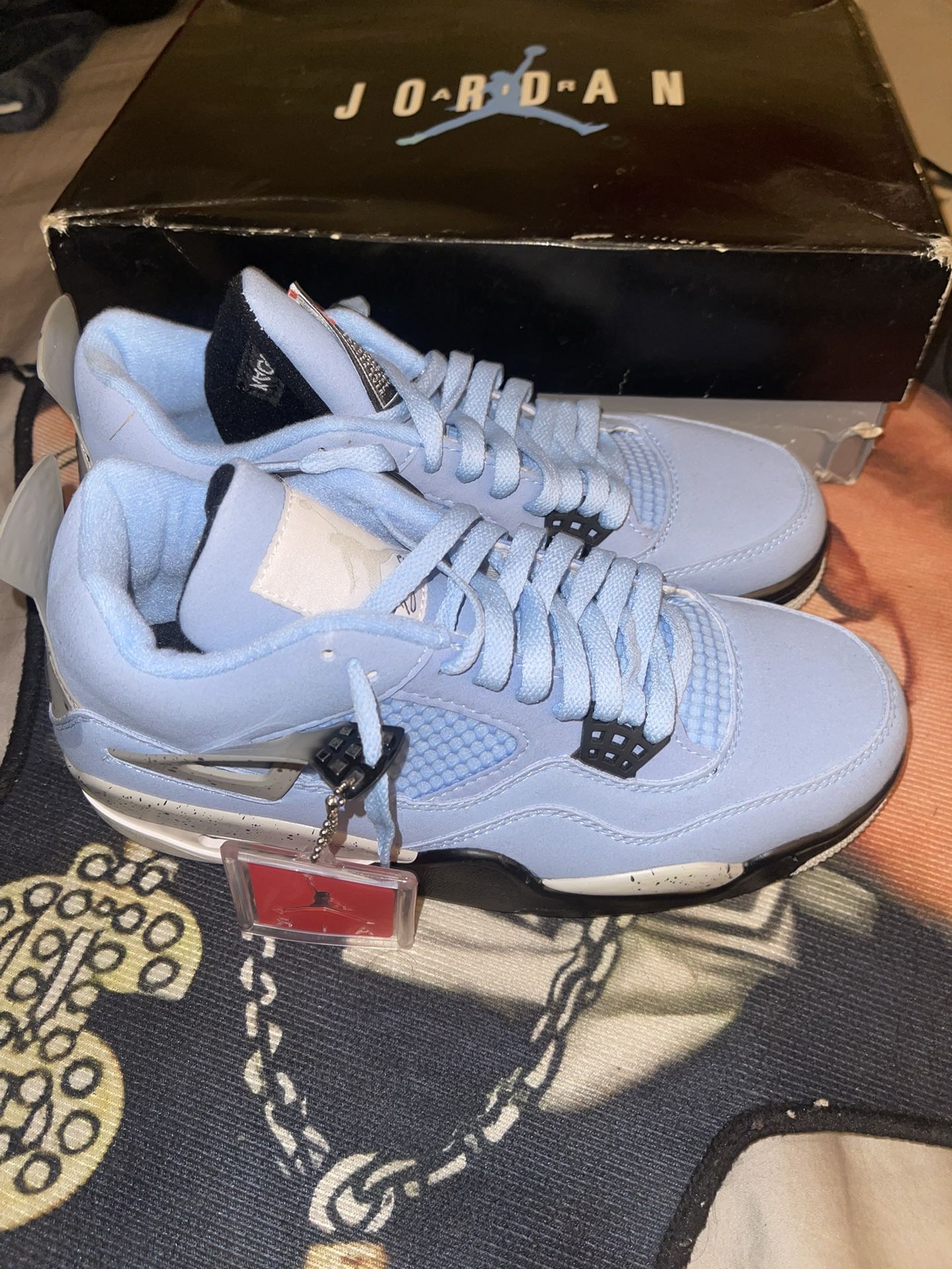 Unc Jordan 4s