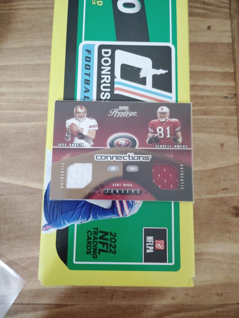 2002 Playoff Prestige Terrell Owens/Jeff Garcia Game Worm Jersey Card Numbered 44/500