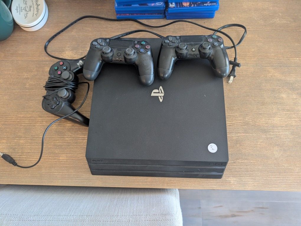 PS4 Pro With Two Wireless And One Wired Controllers