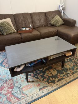 Glass top wooden table