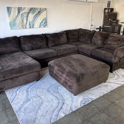 Large sectional couch with chaise and ottoman ( Delivery Available )