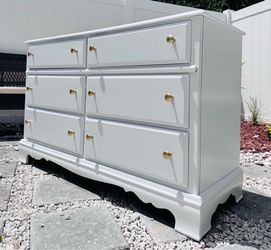 Solid wood Bassett dresser with 6 drawers