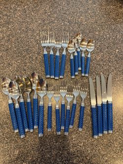25-piece flatware/silverware set featuring bright blue spiral handles with silver-tone accents