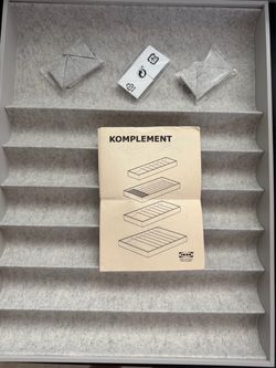 The Ikea KOMPLEMENT Storage with 4 compartments in light gray