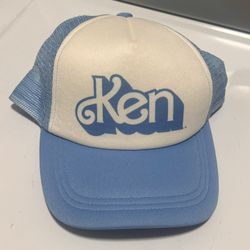 Ken “Barbie” adjusting hat 