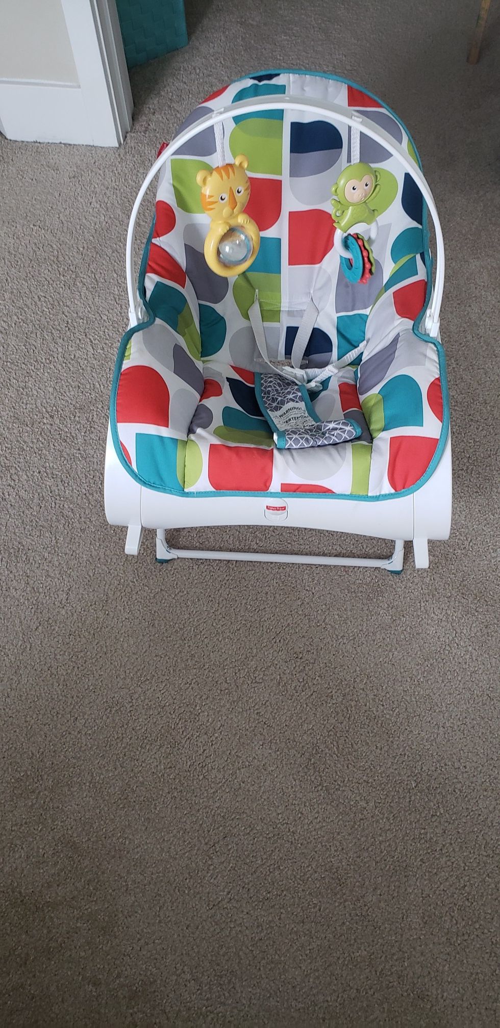 Rocking chair(Fisher price) and pillow (wellifes)