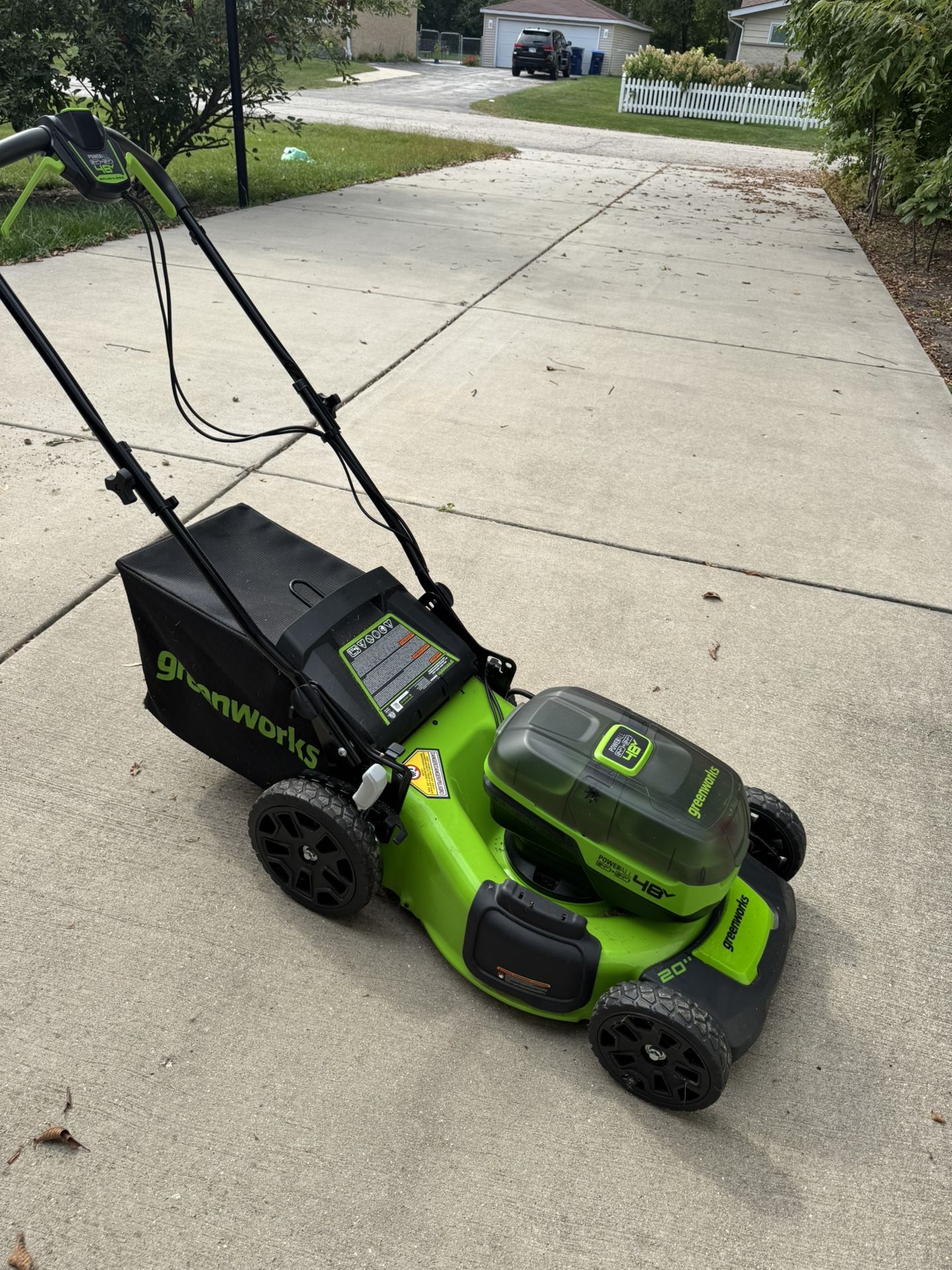 Greenworks 48V Cordless Lawn Mower – 20” Deck – Brand New Brand new, never used. Comes with battery, charger, grass bag, and protective cover. Clean a